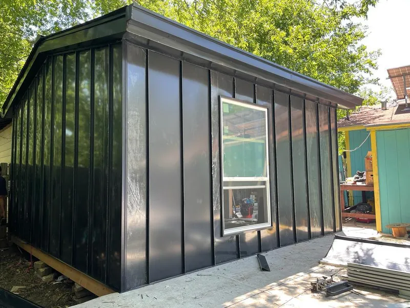 Black standing seam metal wall panels for Metal Roof Installation in Turner